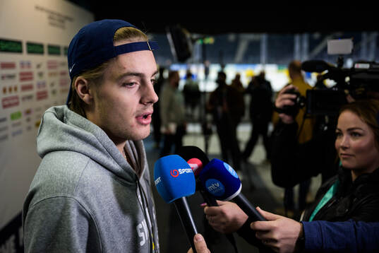 Leo Carlsson of Sweden is being interviewed by media at a