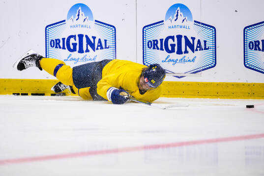 William Nylander of Sweden slips at a practice session