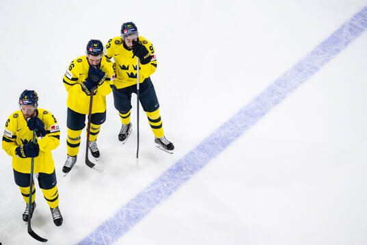 Adam Larsson, Erik Gustafsson and Mika Zibanejad of Sweden