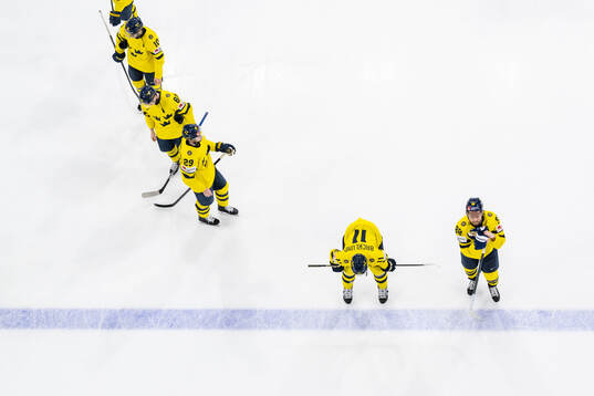 Mikael Backlund and William Nylander of Sweden looks