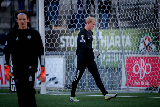 Örebros Buster Runheim och målvakt Malte Påhlsson