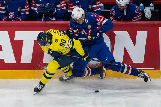 Marcus Johansson of Sweden and Tage Thompson of USA