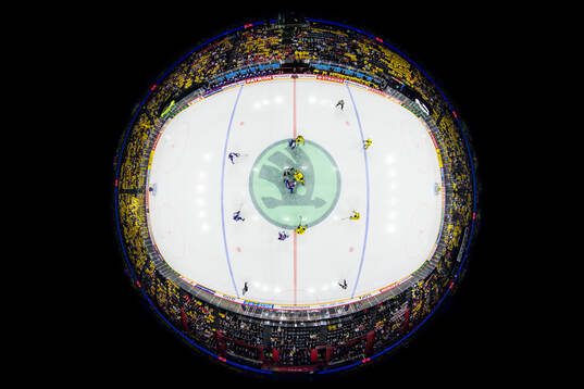 Logan Cooley of USA and William Karlsson of Sweden with the