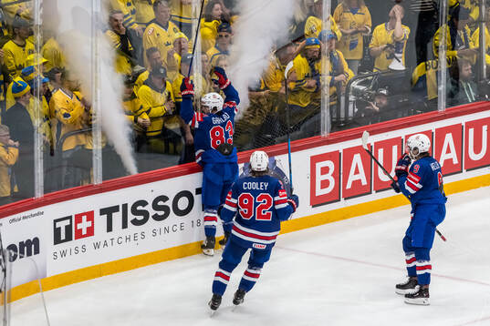 Conor Garland, Logan Cooley, and Clayton Keller of USA