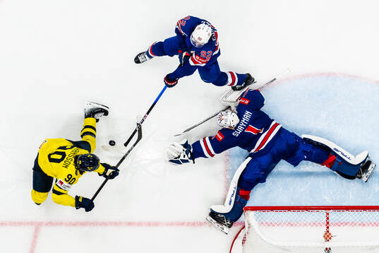 Marcus Johansson of Sweden in action against Logan Cooley