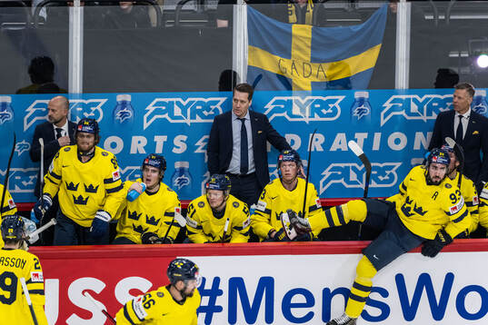 Assistant coach Anders Sörensen, head coach Sam Hallam and