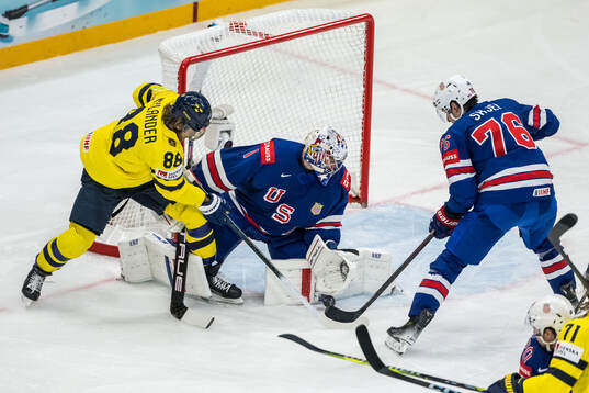 William Nylander of Sweden and goaltender Jeremy Swayman of