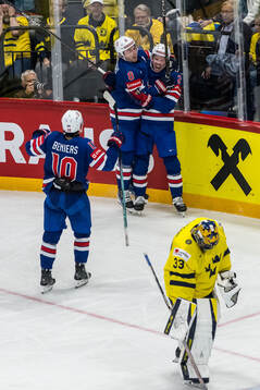 Zach Werenski, Matty Beniers and Jackson LaCombe of USA