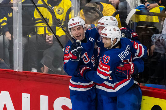 Zach Werenski, Jackson LaCombe and Matty Beniers of USA