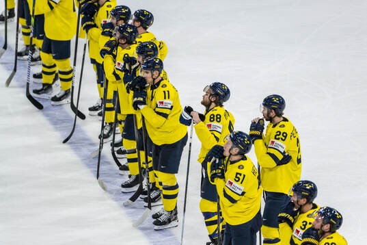 Mikael Backlund and William Nylander of Sweden look dejected