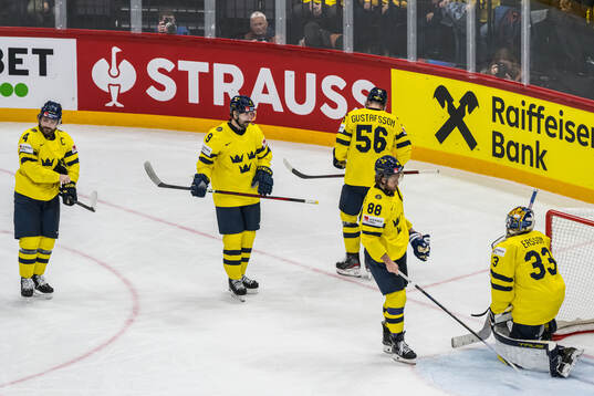 Rasmus Andersson, Filip Forsberg and goaltender Samuel