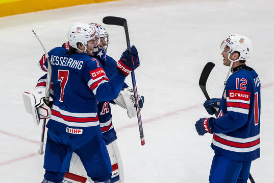 Michael Kesselring, goaltender Jeremy Swayman and Shane