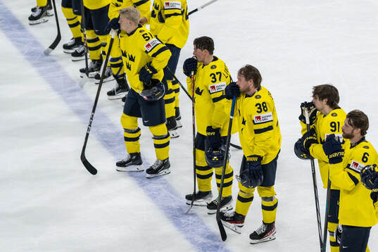Rasmus Sandin of Sweden looks dejected