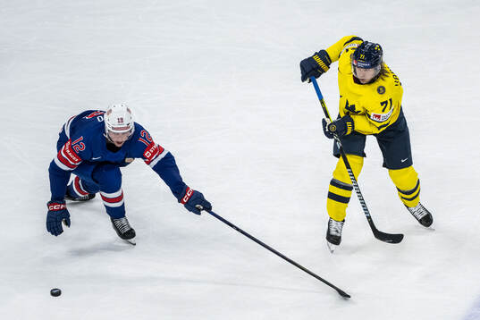 Shane Pinto of USA and William Karlsson of Sweden