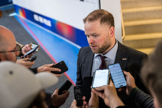Head coach Ryan Warsofsky of USA in mixed zone