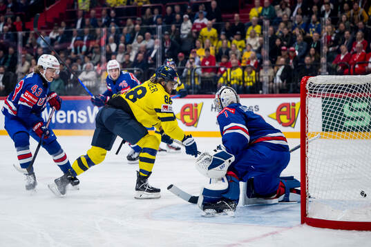 William Nylander of Sweden and goaltender Jeremy Swayman of