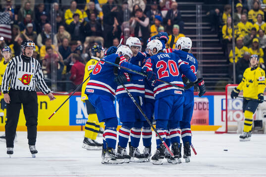 Brady Skjei of USA celebrates with team mates