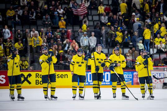 Players of Sweden look dejected