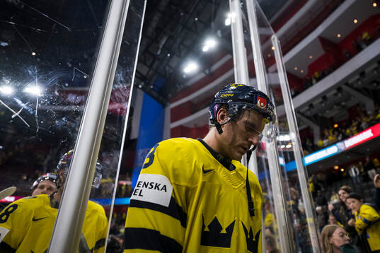 Jonas Brodin of Sweden looks dejected