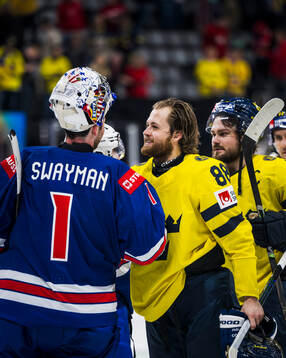 Goaltender Jeremy Swayman of USA and William Nylander of