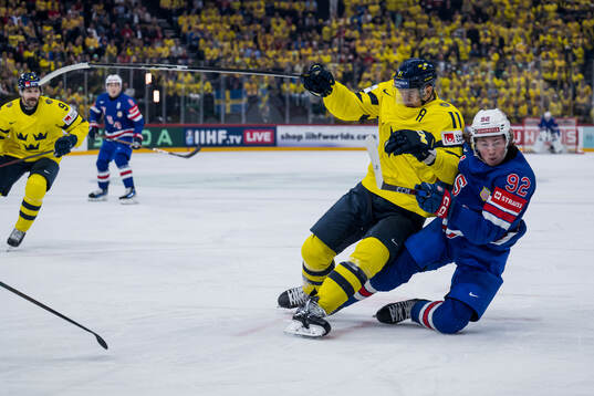 Mikael Backlund of Sweden and Logan Cooley of USA