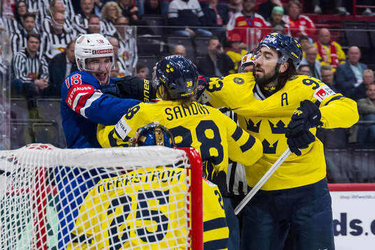Drew O'Connor of USA and Mika Zibanejad of Sweden