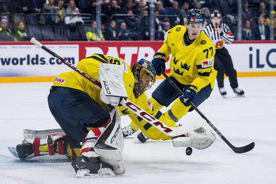 Goaltender Jacob Markström and Simon Edvinsson of Sweden