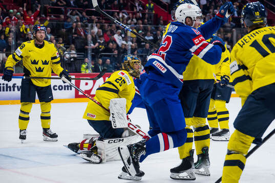Goaltender Jacob Markström of Sweden looks dejected