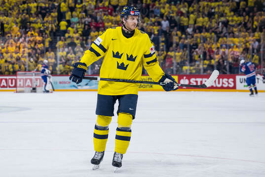 Jonas Brodin of Sweden looks dejected
