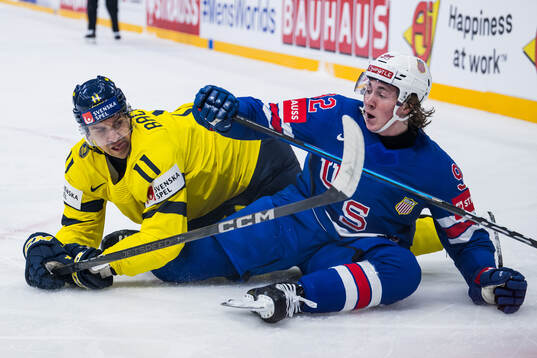 Mikael Backlund of Sweden and Logan Cooley of USA