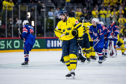 Rasmus Andersson of Sweden looks dejected