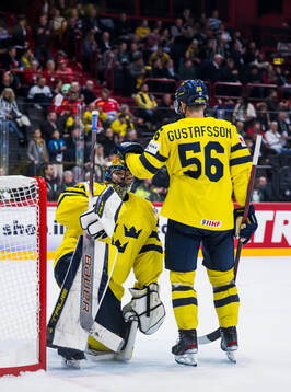 Goaltender Samuel Ersson and Erik Gustafsson of Sweden look