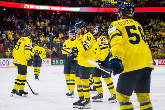 Alexander Wennberg and Mika Zibanejad of Sweden look