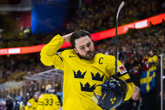Rasmus Andersson of Sweden looks dejected