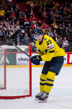 Lucas Raymond of Sweden breaks his stick