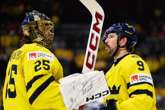 Goaltender Jacob Markström and Filip Forsberg of Sweden