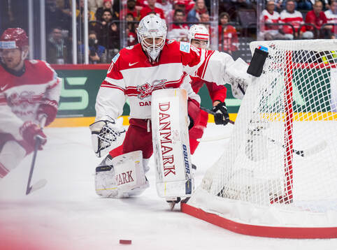 Goaltender Frederik Dichow of Denmark