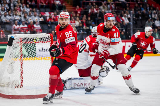 Sven Andrighetto of Switzerland and Jesper Jensen Aabo of
