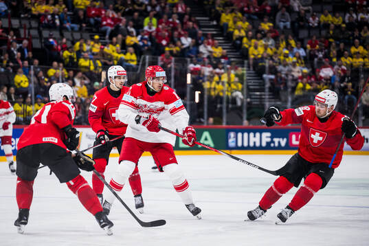 Alexander True of Denmark and Timo Meier of Switzerland