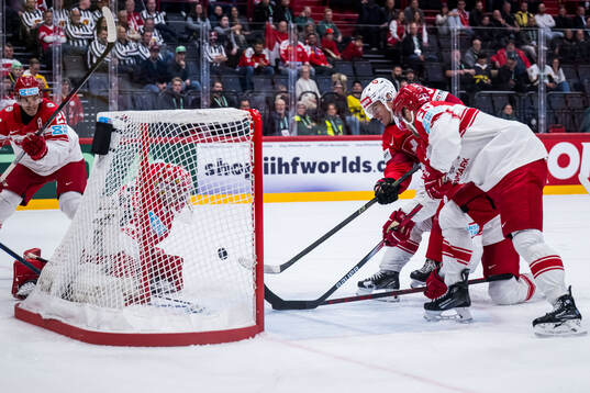 Tyler Moy of Switzerland scores 7-0
