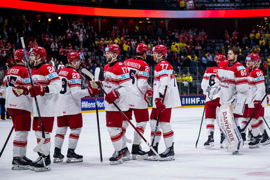 Players of Denmark look dejected