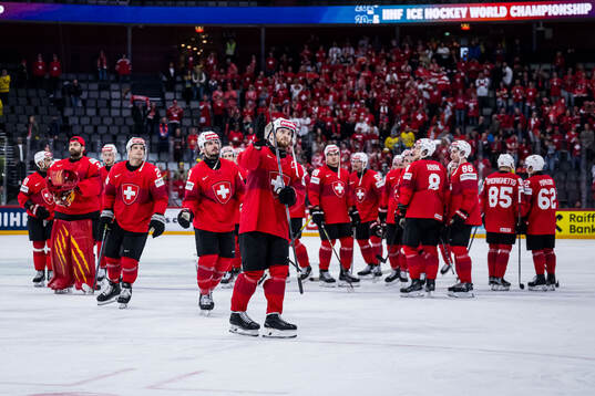 Players of Switzerland celebrate