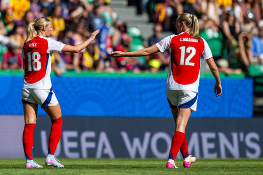 Chloe Kelly and Frida Maanum of Arsenal