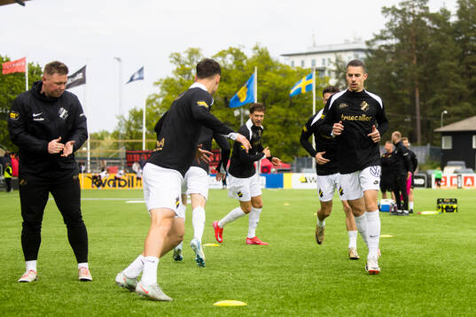 AIKs spelare värmer upp