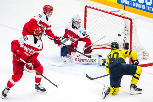 Marcus Johansson of Sweden scores 3-0 past Anders Koch,