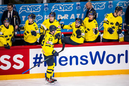 Lucas Raymond of Sweden celebrates with Mika Zibanejad