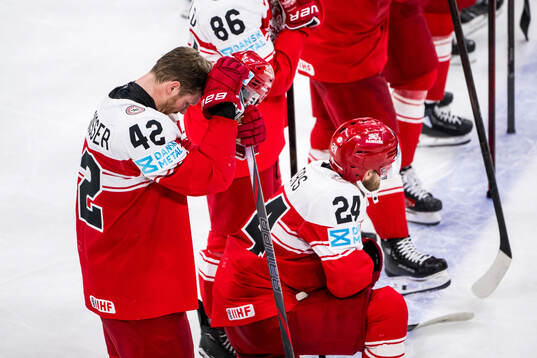 Phillip Bruggisser and Nikolaj Ehlers of Denmark looks