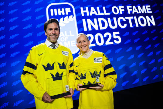 Henrik Lundqvist and Kim Martin-Hasson of Sweden pose with
