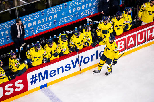 Mikael Backlund of Sweden celebrates with team mates