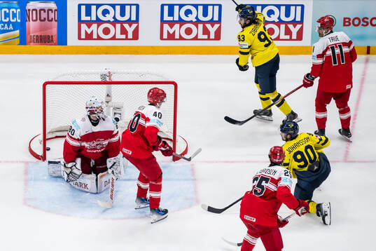 Mika Zibanejad and Marcus Johansson of Sweden celebrates